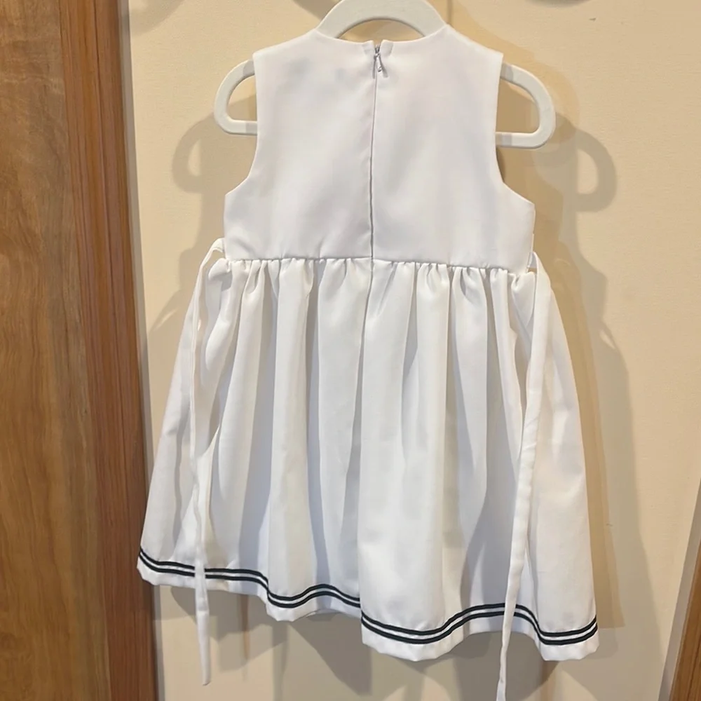White Sleeveless A-Line Dress with Pleated Embellishments